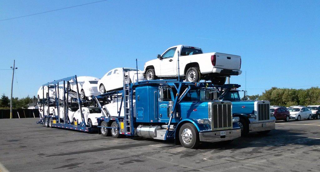 Open car carrier transporting vehicles from Massachusetts to Florida