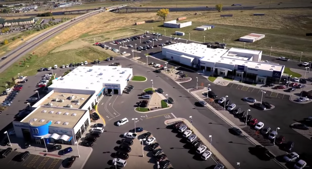 Car being delivered in Billings, Montana neighborhood